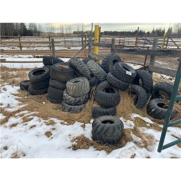 1- Pile of used Quad tires (used for tarps)