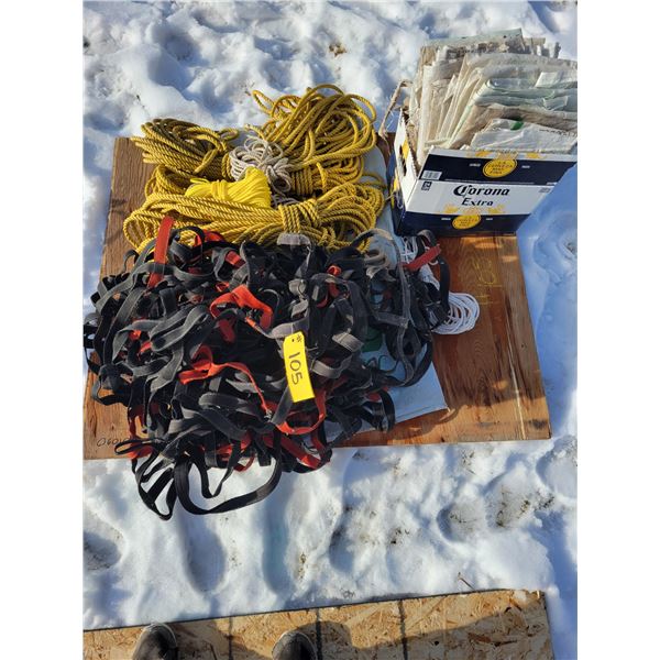 1 extra-large cargo tie down; large quantity of various lengths of  nylon rope; quantity of seed sac