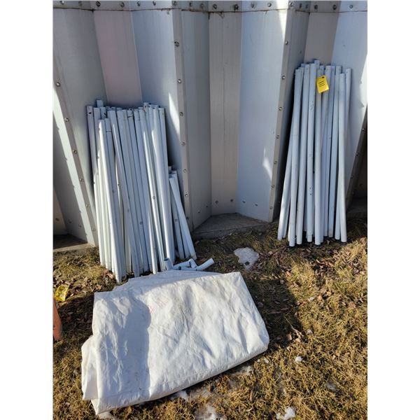 Cover tent with posts - couple posts may be missing; quantity metal posts; 45" x 59" paper board