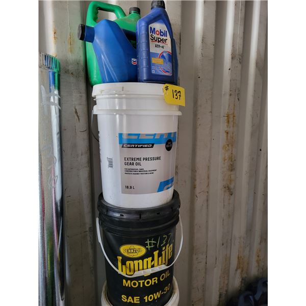 5-gallon 80W-90 gear oil, open 3/4 full; 5-gallon 10W-30 motor oil, open half full; 5-gallon anti-we