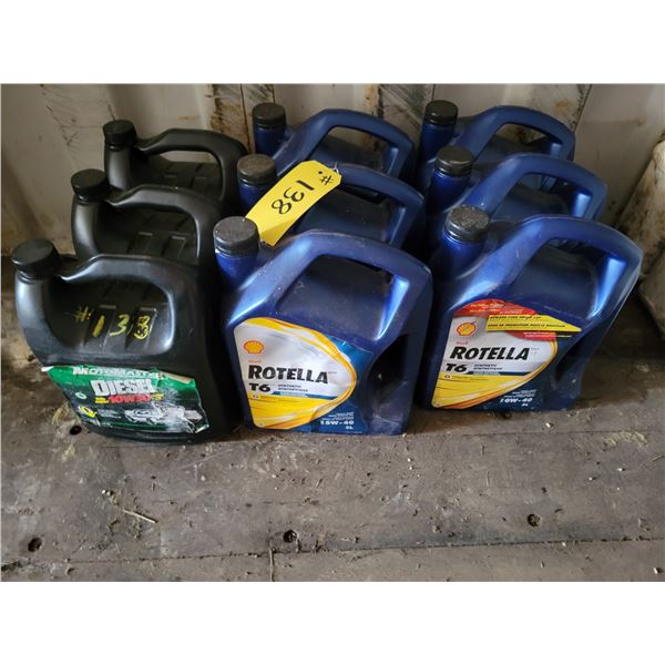 Three 10W-30 diesel oil, 2 unopened, 1 open 1/4 full; 3 jugs 15W-40 diesel motor oil, unopened, 3 0
