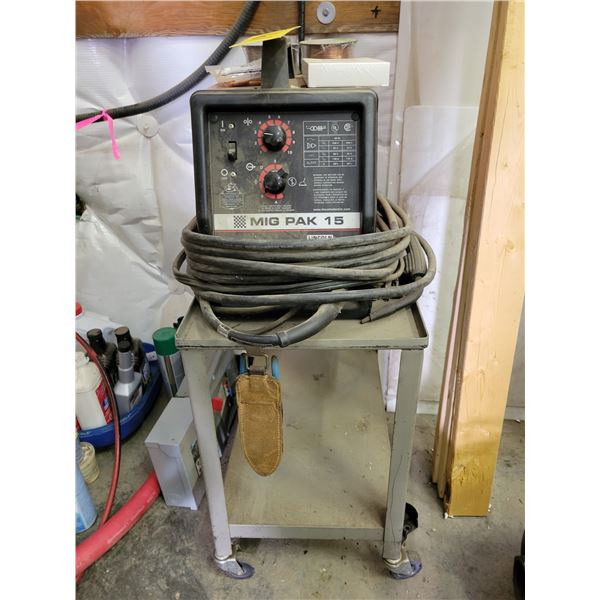 MIG pack welder; stand; extra tips & flux core