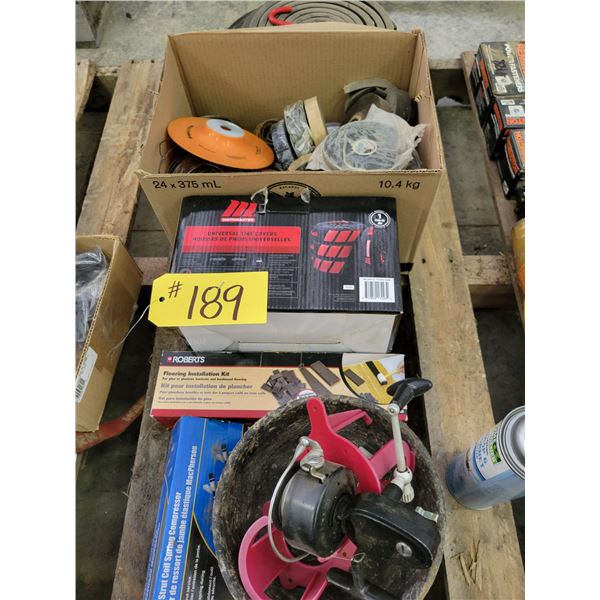 2 small rubber bowls; spare tire cover; 2 tack holders; fishing reel; strut coil spring compressor -