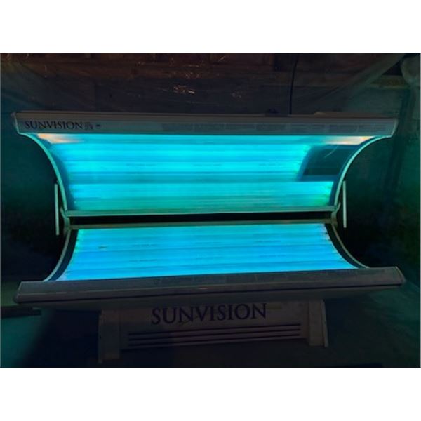 Sunvision Pro 24SF suntanning bed, face lamp needs to be replaced, manual can be found at www.suncot