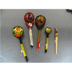 Lot of 4 wooden Russian spoons and a wooden Russian stirrer