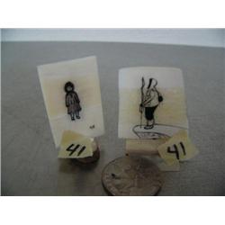 Lot of 2 scrimshawed ivory platchets each approx. 1-3/4" tall on with ivory base- Eskimo girl & hunt