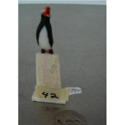 3" tall carved ivory puffin on ivory made by Thomas Pushruk from King Island at age 79