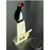 Image 2 : 3" tall carved ivory puffin on ivory made by Thomas Pushruk from King Island at age 79