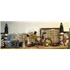 Image 1 : Shelf of nautical items: 5 model ships, 2 large lighthouses, 5 smaller lighthouses, 2 "WELCOME ABOAR