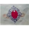 Image 1 : Ruby and Diamond Lady's Ring 14 K yellow gold- ruby is oval, faceted, approx. 1.00 carats, transluce