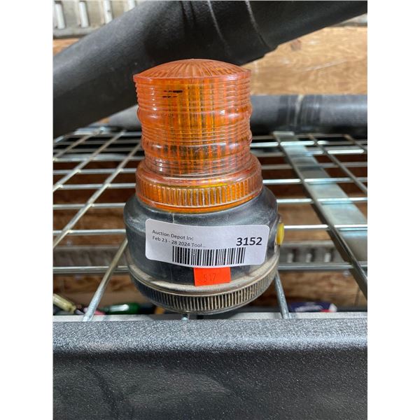 Yellow flashing emergency light with magnetic base