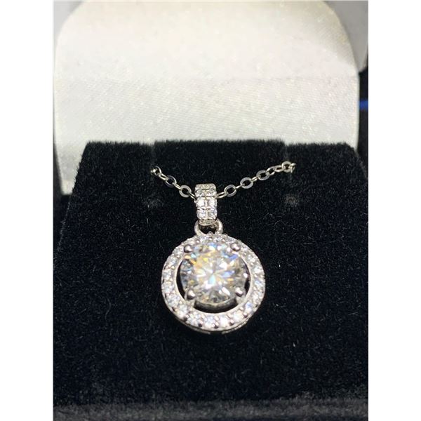 GRA CERTIFIED MOISSANITE VVS D WEIGHING AN APPROX. WEIGHT OF 1.00 CARAT WITH HALO OF 30 SHARED PRONG