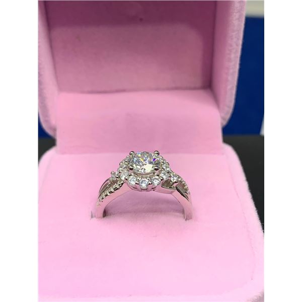 GRA CERTIFIED MOISSANITE VVS D APPROX. 1.00 CARAT SET IN CENTER WITH 26 CUBIC ZIRCONIUM SET IN HALO 