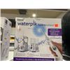 Image 1 : Waterpik Water Flosser Oral Care System
