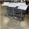 Image 1 : 3 WHITE GAS LIFT BAR STOOLS