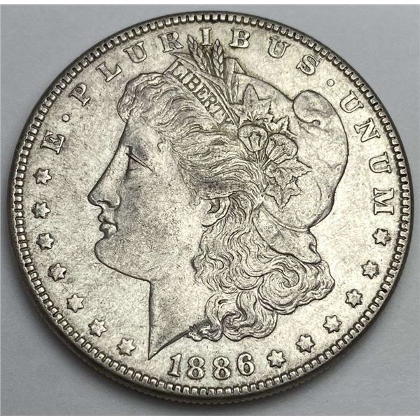 From Set (1) 1886 Morgan Silver Dollar AU