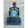 ornate musical jewelry box with clock and photo frame  -- Is resin or plastic composition