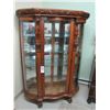 Image 1 : Victorian ornate serpentine curved front China Cabinet with Griffin's head carvings and Lions paw fe