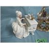 Image 3 : figurines of lady playing piano ( lady is musical ) and boy with baskets