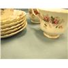 Image 8 : granite mortar and pestle, cups and saucers, teapots