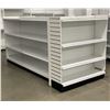 Image 1 : 4 tier retail shelving double-sided gondola with single end cap - missing one unit of shelving due t