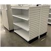 Image 3 : 4 tier retail shelving double-sided gondola with single end cap - missing one unit of shelving due t