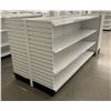 Image 4 : 4 tier retail shelving double-sided gondola with single end cap - missing one unit of shelving due t