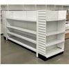 Image 1 : 4 tier retail shelving double-sided gondola with end caps (approx. 132in W 61in H 38in D - excellent