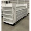 Image 1 : 5 tier retail shelving double-sided gondola with end caps (approx. 132in W 61in H 38in D - excellent