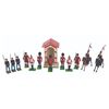 Image 1 : A Collection of Toy Soldiers and a Guard Stand.