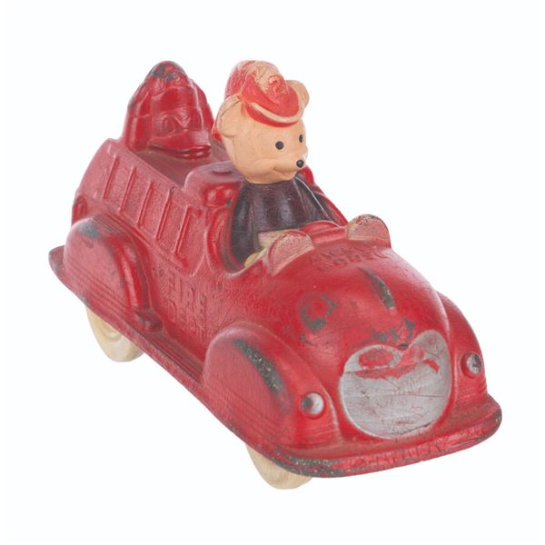 A Mickey Mouse Fire Engine Toy.