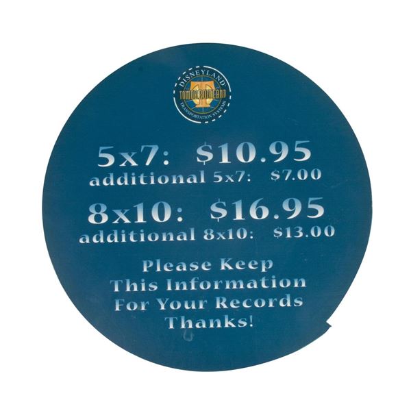 A Tomorrowland Photo Prices Sign.