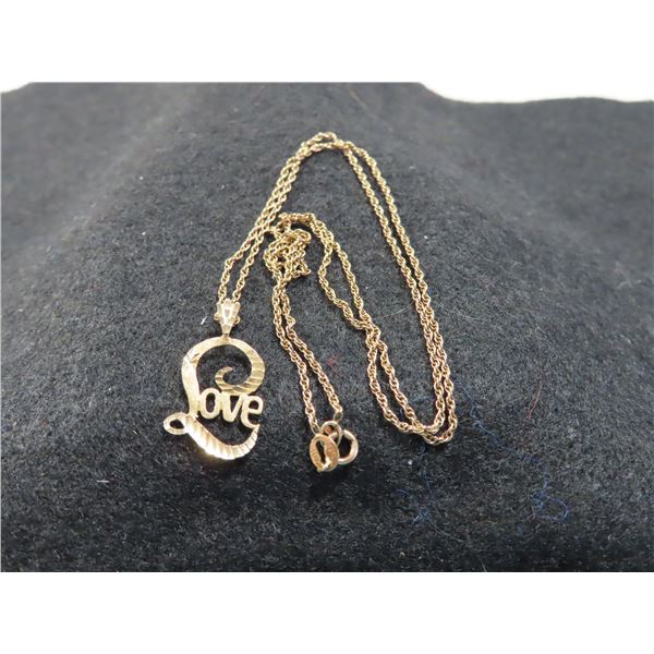 10 K Yellow Gold Love charm on 10K Yellow Gold chain.