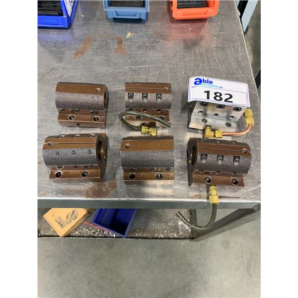 GROUP OF 6 ID 1 1/4  TOOL HOLDERS