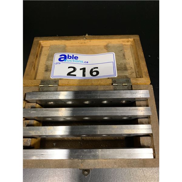 MATCHED SET OF 4 STEEL PARALLELS WITH WOODEN CASE