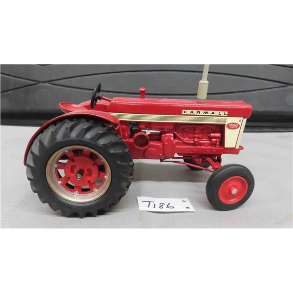 Farmall 560 Die Cast Metal Tractor with Rubber Tires, 5.25" x 6" x 9"