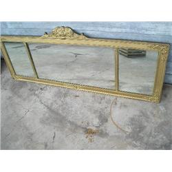 Ornate gold framed mirror
