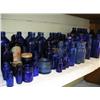 Image 1 : Large lot of old blue medicine bottles