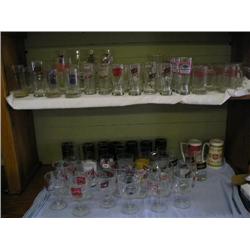 Large lot of beer glasses