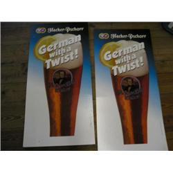 Two cardboard beer signs