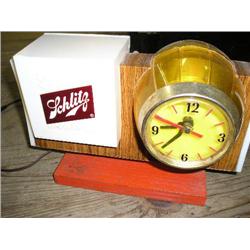 Schlitz clock & lighted beer sign