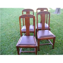 4 handcarved chairs w/leather cushions