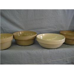 Four old mixing bowls