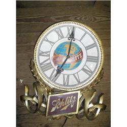Schlitz clock and light