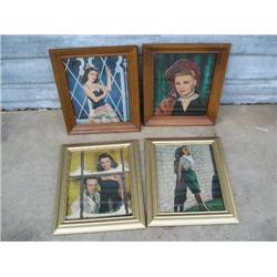 Four framed movie star prints