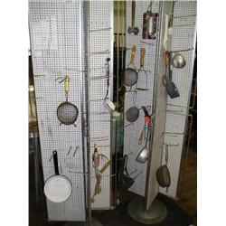 Pegboard displays w/old kitchen utensils