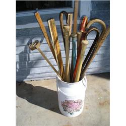 Old milk can, branding iron, canes, misc