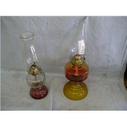 2 hurricane lamps