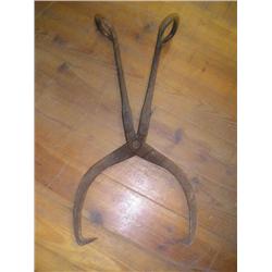 Very old heavy ice tongs