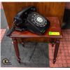 ROTARY PHONE ON A SMALL TABLE H-13.5" W-9.25"